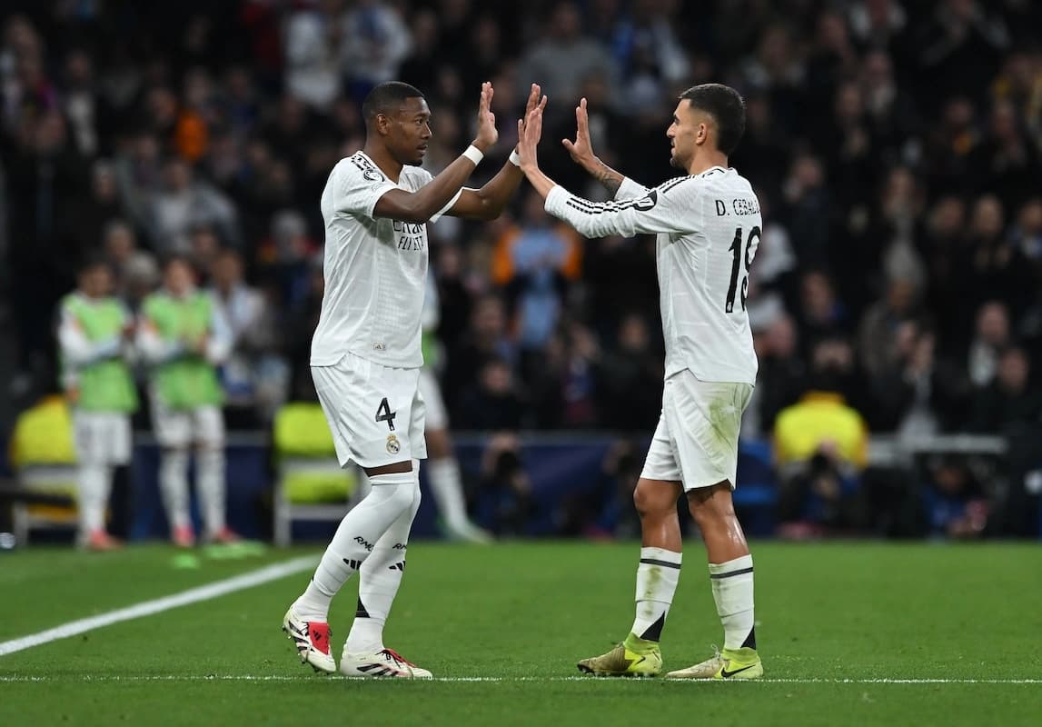 MADRID, SPAIN - JANUARY 22: David Alaba of Real Madrid interacts with Dani Ceballos as he leaves the field whilst being substituted during the UEFA Champions League 2024/25 League Phase MD7 match between Real Madrid C.F. and FC Salzburg at Estadio Santiago Bernabeu on January 22, 2025 in Madrid, Spain. (Photo by Denis Doyle/Getty Images)